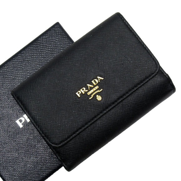 Prada Handbags - Prada bi fold leather wallet Navy Blue pink gold